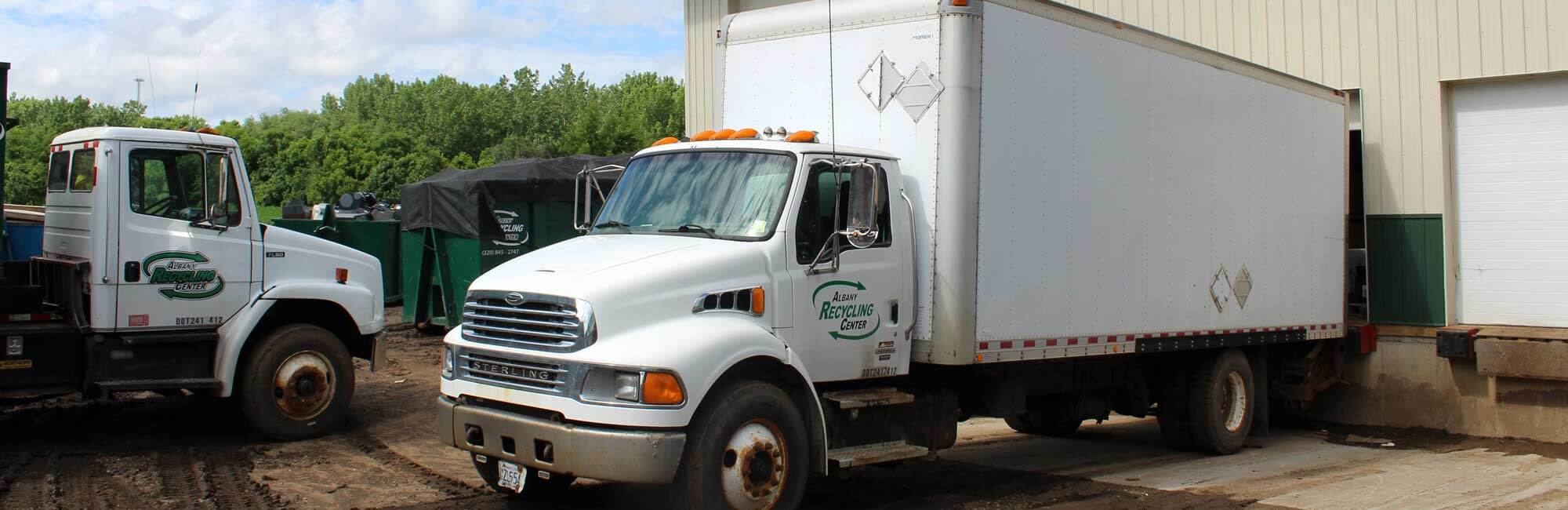 Albany Recycling Center trucks at the shop dropping off collected materials